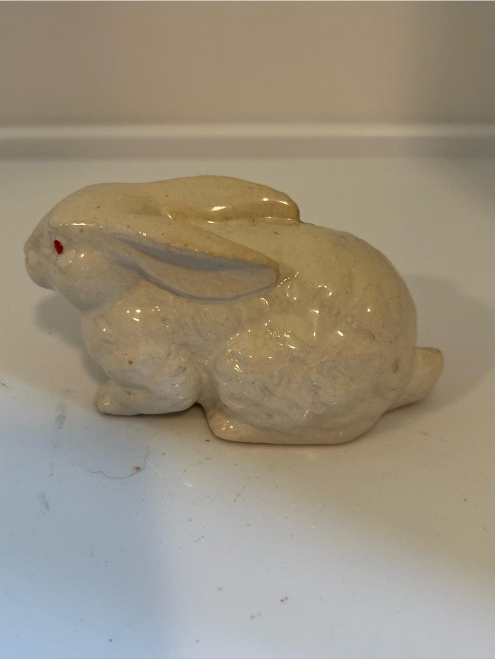 Source Unknown Cream Ceramic Rabbit Figurine with Red Eye
